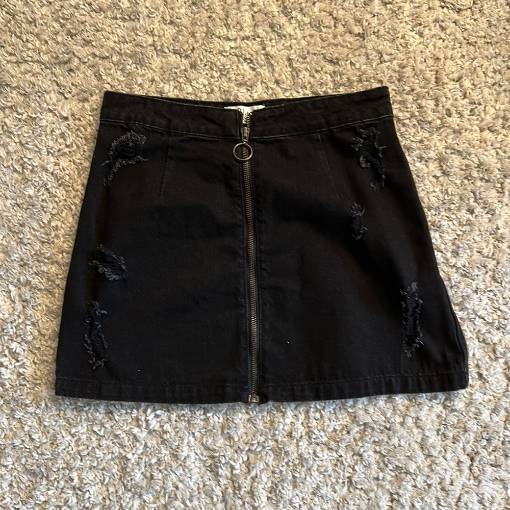 Tobi distressed denim skirt with zipper down middle. Perfect condition. Size 28